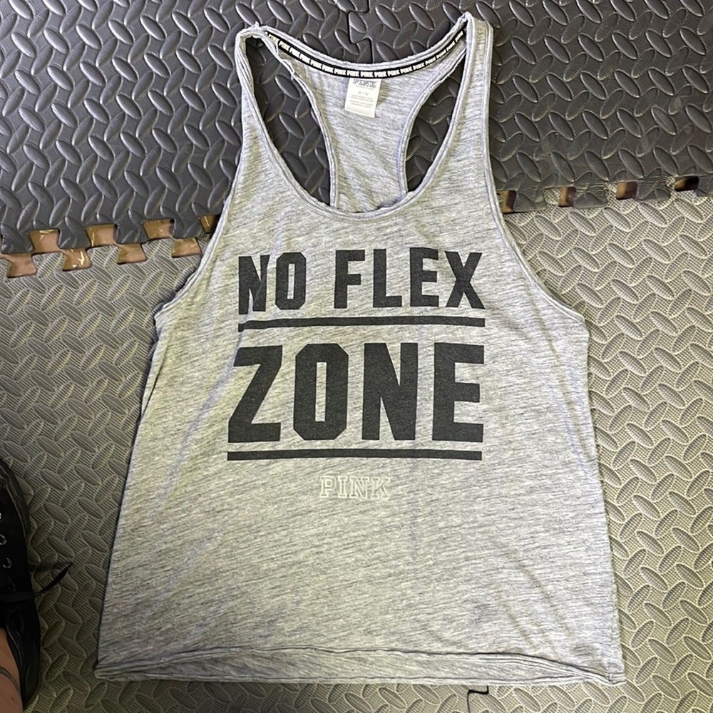 Pink workout tank . Over sized medium